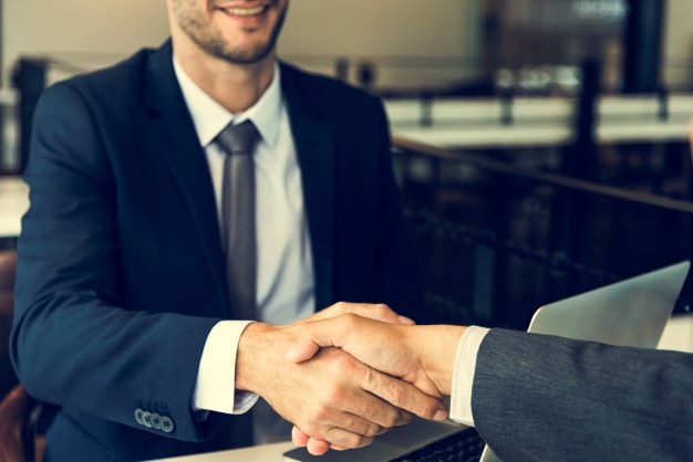 corporate business men handshake meeting