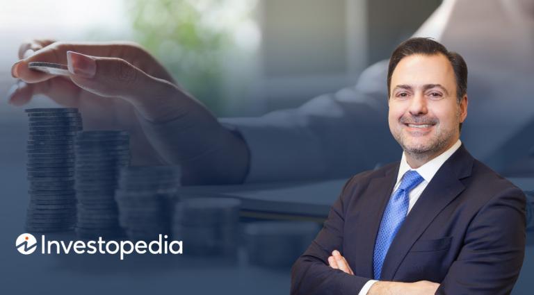 Asher Rubinstein in the right foreground of an image of a hand stacking coins in stacks of increasing height. The logo of Investopedia is in the bottom left hand corner.